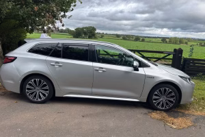 grey toyota car viewd from the side